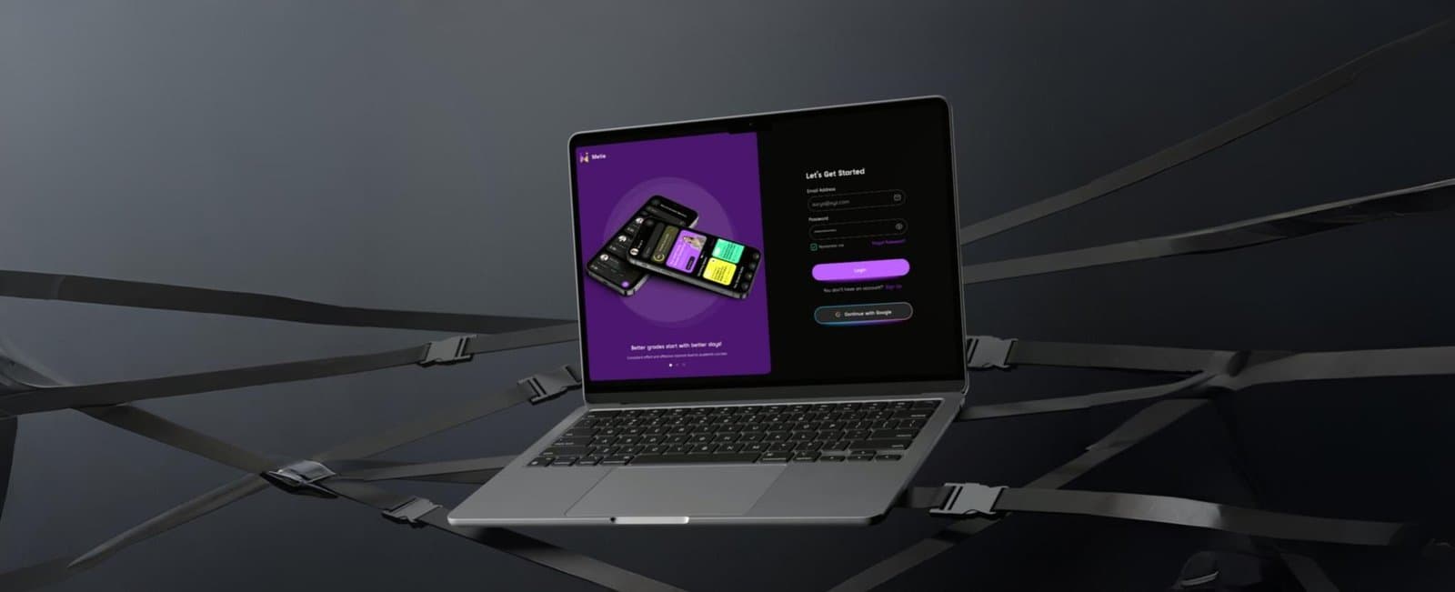 Laptop on a dark desk showing a purple software dashboard