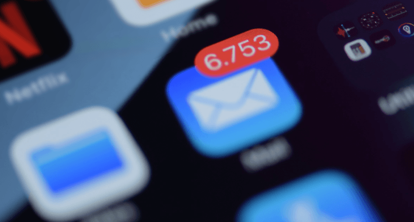 Smartphone mail app icon with a large unread count, representing email marketing campaigns