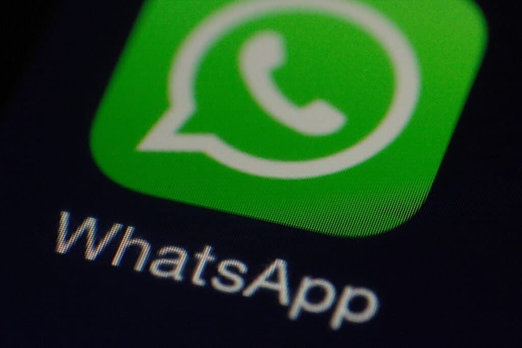 Close-up of the WhatsApp app icon on a smartphone screen